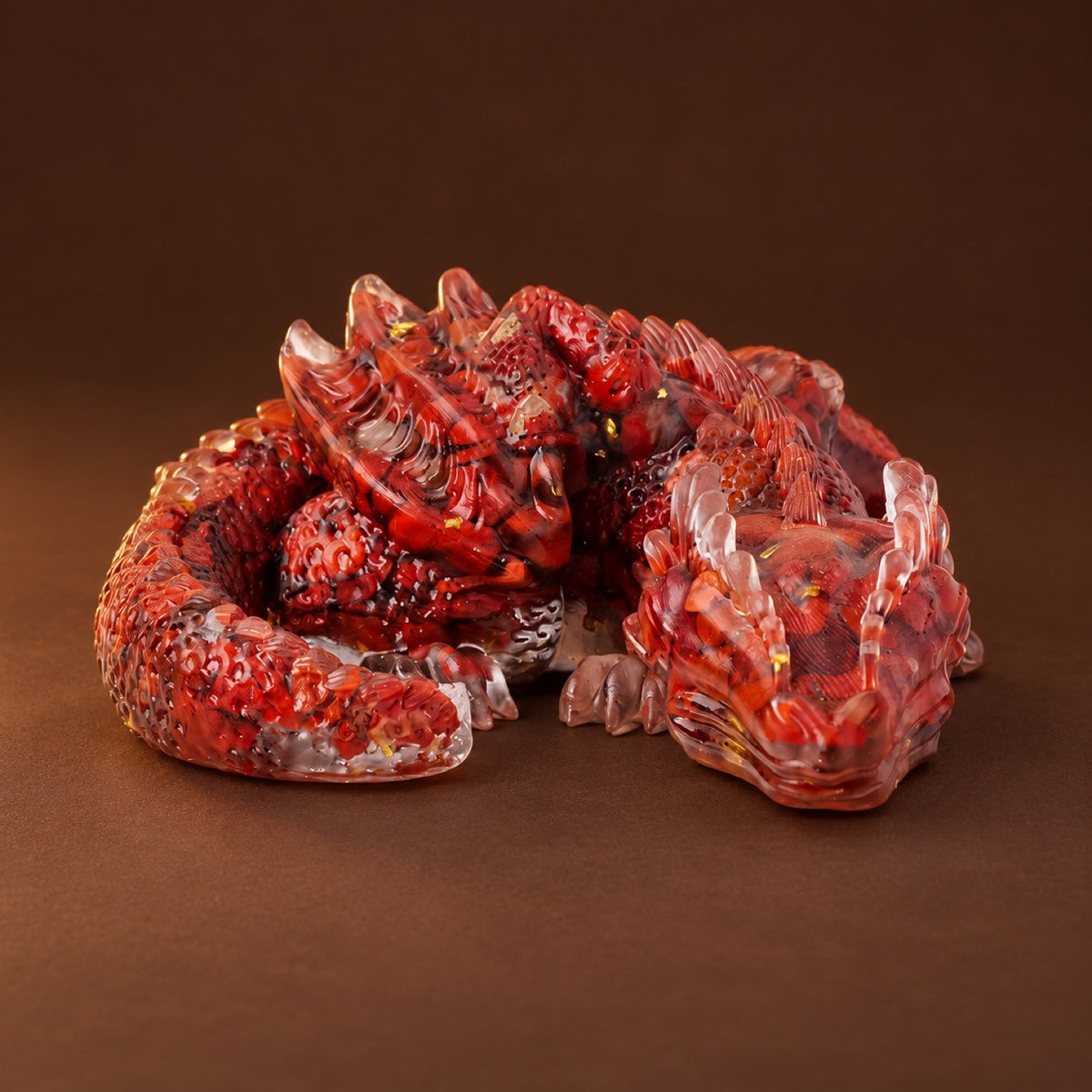 Resin sleeping dragon figurine with Red Jasper chips and gold flakes