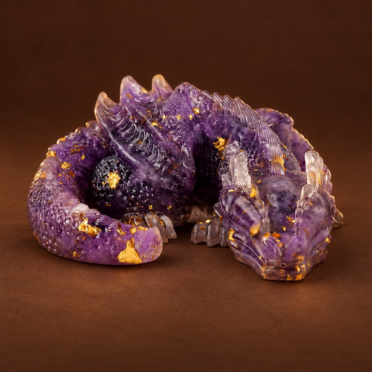 Resin sleeping dragon figurine with Amethyst chips and gold flakes