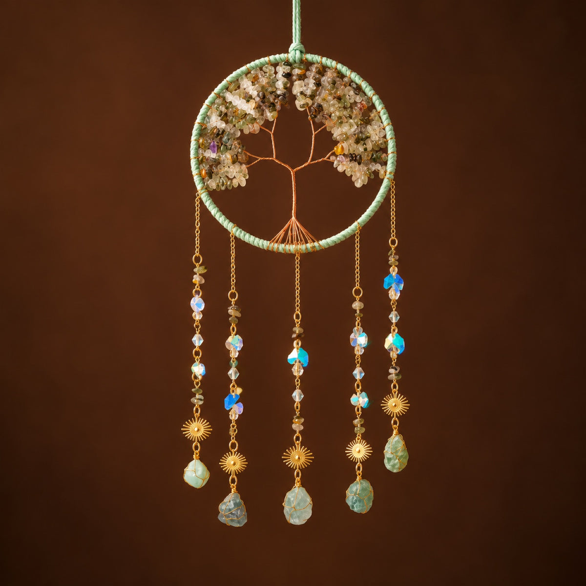 Green tree of life hanging with raw crystal drops
