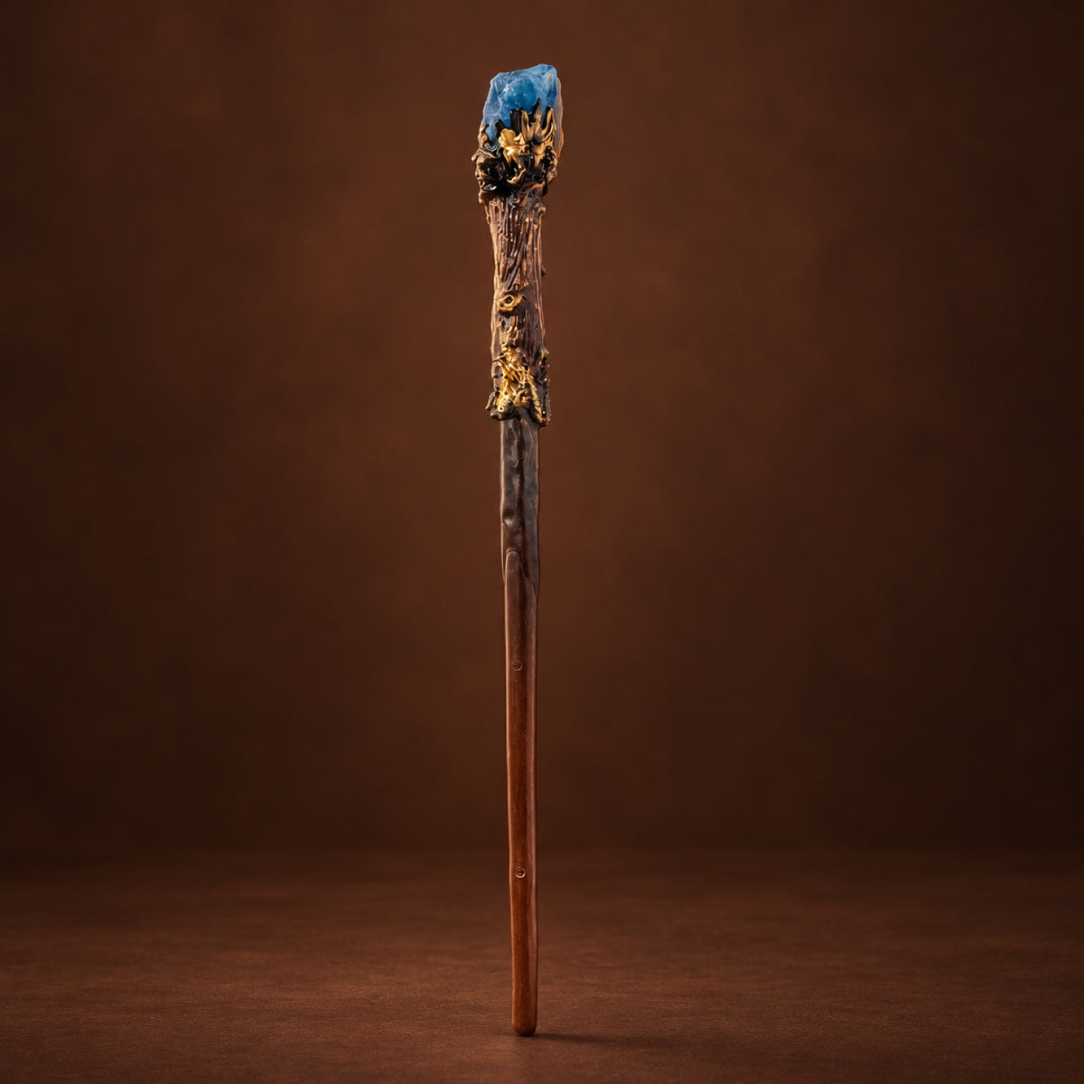 Magic wand topped with Blue Fluorite in a gold-tone setting
