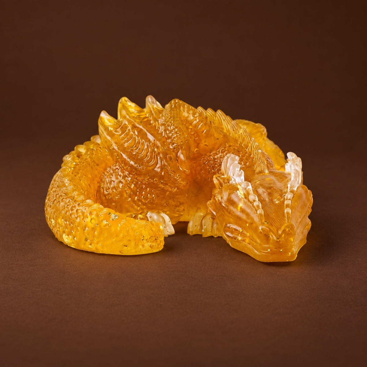 Resin sleeping dragon figurine with Dyed Yellow Quartz chips and gold flakes