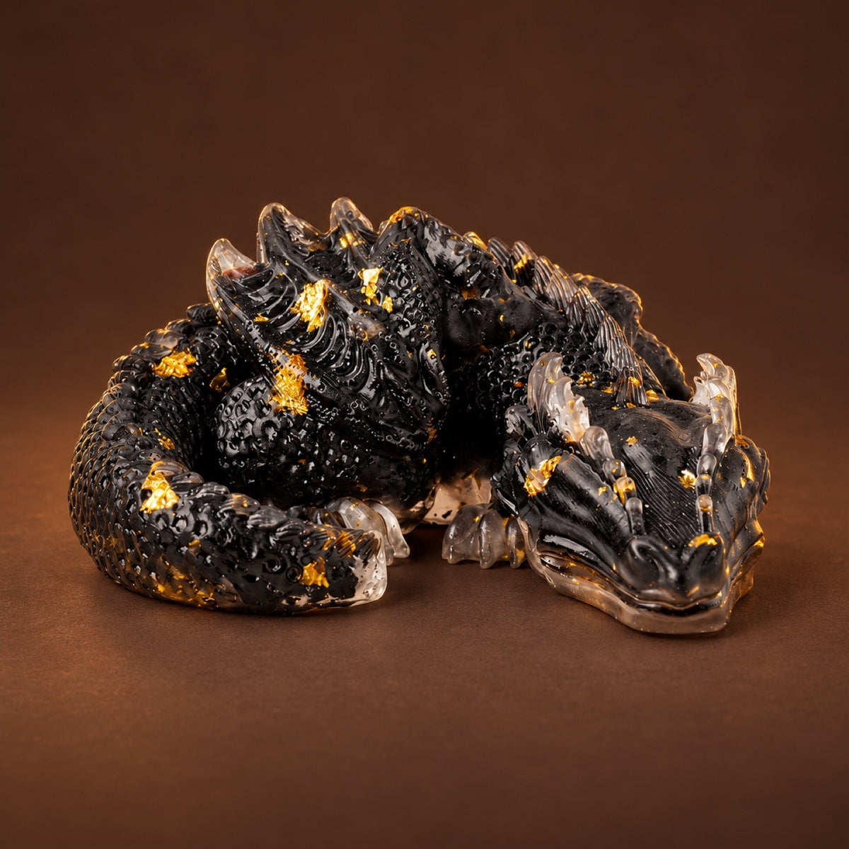 Resin sleeping dragon figurine with Obsidian chips and gold flakes