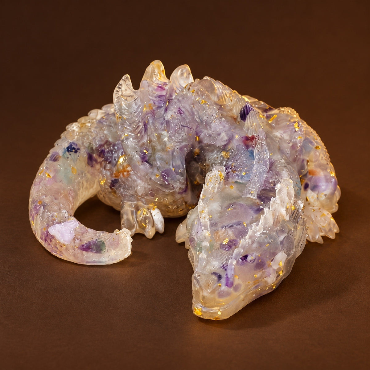 Resin sleeping dragon figurine with Rainbow Fluorite chips and gold flakes