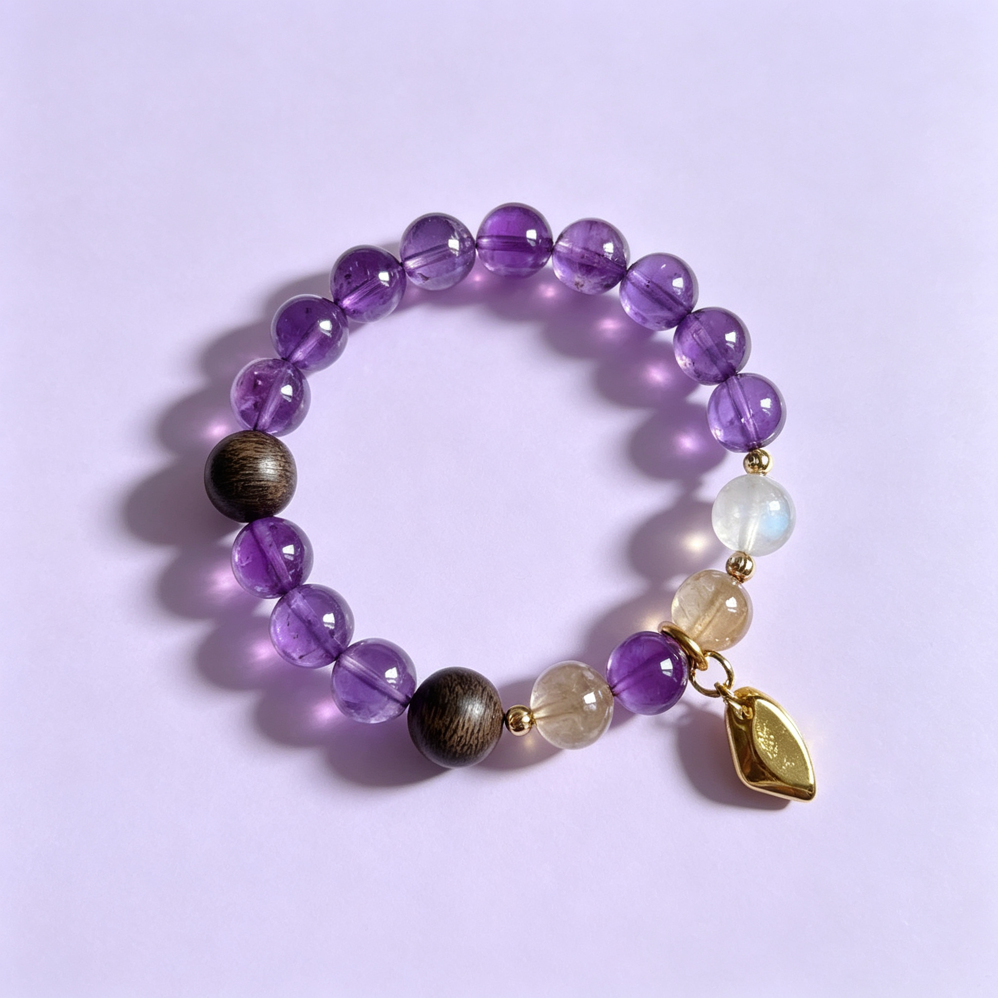 Retouched photograph of bracelet 001: violet tones · leaf detail