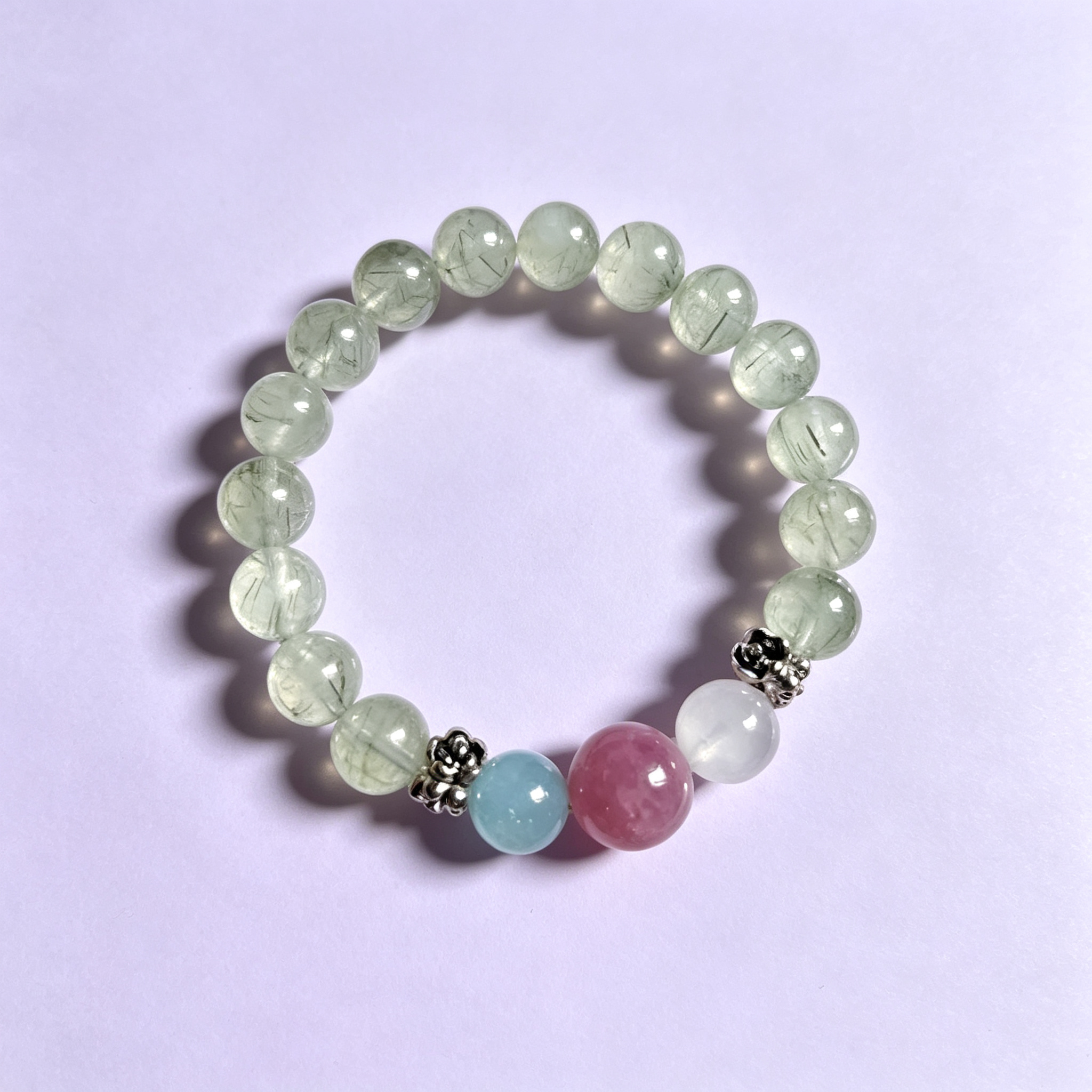 Retouched photograph of bracelet 003: soft greens · a little pastel color